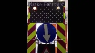 VMS sign Tunnelw&auml;sche - Nasse Fahrbahn