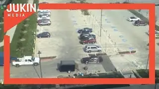 Car Drives Through Wet Cement