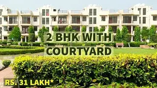 2 bhk lowrise floor with courtyard/wave floor nh 24 ghaziabad/ready to move/private garden/27.85lakh