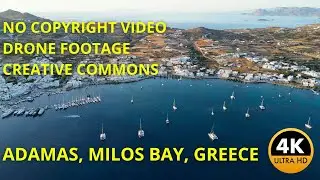Flying over Adamas on Milos, Greece - Creative Commons Video - Free to download and use