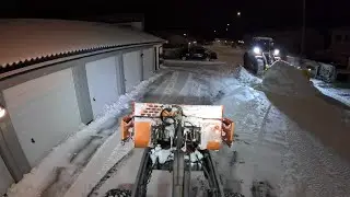 Plowing a HUGE apartment area in the middle of a snowstorm