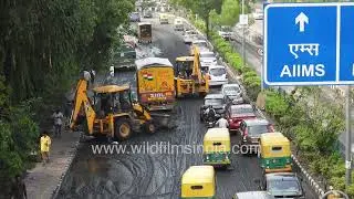 Public Works Department clearing mud after maintenance works