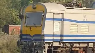 UNIQUE SILVER/YELLOW/BLUE DETC ENGINE MOVES AT DEPARTMENTAL YARD
