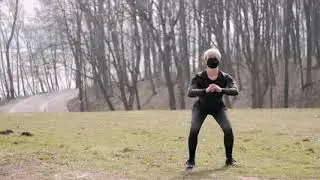 Squat outdoor work out with mask