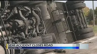 Semi crash with 74,000 lbs. of chicken closes road