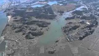 Tsunami Survivors Rebuild As Japan Battles Debris