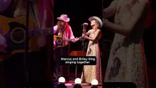 Marcus and Briley King singing together