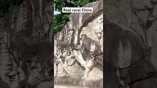 A real rural China. This statue commemorates the Chinese people's resistance to Japanese aggression.
