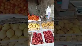 Watching Fruits Display #fruits #fruitdisplay #streetvendor