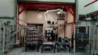 PALLETIZER logistic robotics automation with AGV COMAU by Siscodata