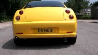 Modified Fiat Coupe 20vt pulling away. 3