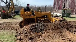 Old International TD-9 Bulldozer Pushing Some Dirt