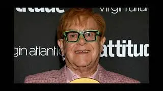 Sir Elton John confesses 'I'm still happy to be a gay man' in emotional speech after receiving the A