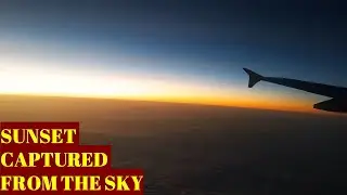 Beautiful view of sunset during flight from Goa to Lucknow. Aerial view of sunset and clouds.