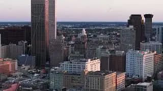 Stunning aerial view of new orleans at sunset, showcasing its iconic skyline and distinctive