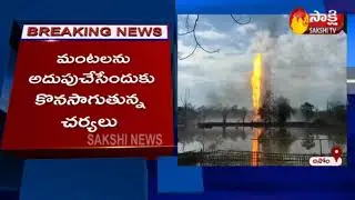 Massive fire at leaking OIL well in Assam | Sakshi TV