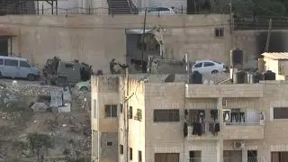 Israeli forces in West Bank shoot two men after surrender | AFP