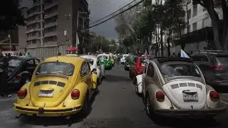 Enthusiasts in Mexico City mark International Volkswagen Beetle Day with parade