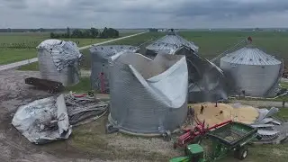 Grain bins in Taylor Ridge, Illinois, sustain significant damage following Tuesday's storms