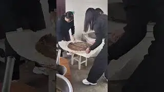 The process of making a large pizza