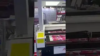 JHXlaser dual head asynchronous visual cutting machine and visual flying Galvo machine at exhibition