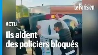 Marseille : des jeunes aident des policiers bloqués dans une voiture retournée