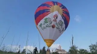Tibetan flag balloon takes to the sky after Chinese officials try to ground it