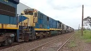 Graneleiro MRS vazio sentido ZRX com 1 U23 C duas C36 sendo levada para outra empresa de trem