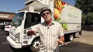 Grocery store owner discusses the benefits of their Isuzu refrigerated truck