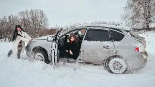 CAR STUCK || Chris and Ellie get stuck in the snow in their 4WD Subaru