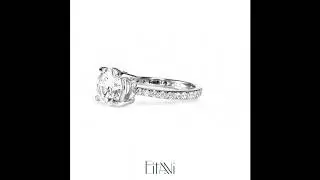 Traditional Basket Setting Round Brilliant Engagement Ring With A Reverse Taper Accent