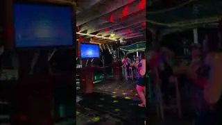 Amazing Caribbean karaoke at over the water restaurant bar Happy Harry&rsquo;s West End Roatan