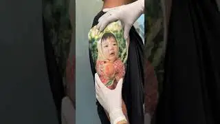 Babby portrait tattoo art by © Victoria Lee Tattoo.
