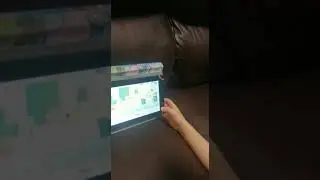 Child reading along with Joy School English (Costa Rica)