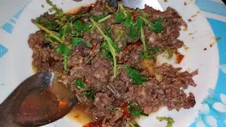 Spicy stir-fried field rat with side dishes.