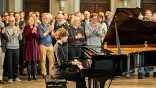 Waitress Approaches the Piano &mdash; Her Music Brings the House to Its Feet....