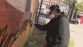 Latinx artist transforms blank building walls into beautiful murals