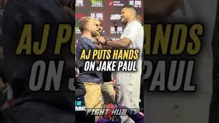 Anthony Joshua PUTS HANDS on Jake during face off & tries to steal his chain!