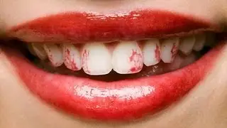 Pro Tip: Keep lipstick off your teeth