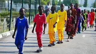 Nigeria says it will increase security around schools as it welcomes back abducted students