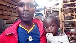 Brother Enos Worshipping with Kibera Slum Children WFF-GMFC Fellowship