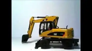 Масштабная модельCaterpillar M316D Колесный экскаватор-производитель NORSCOT