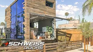 Modern Beach House with a Schweiss Doors Hydraulic Glass Wall