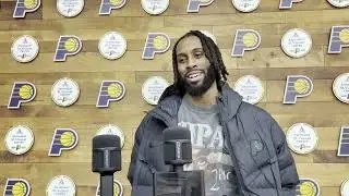 Rick Carlisle, Bennedict Mathurin, Jay Huff, Isaiah Jackson, Ethan Thompson talk at Pacers practice