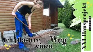 Weg pflastern