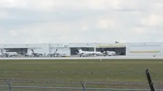 Tate brothers return to US amid human trafficking charges