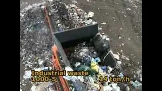 M&J EtaPreShred 1000 waste shredder in action - shredding industrial waste