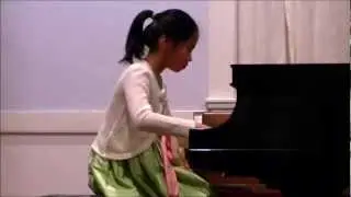 10 year-old girl performing Bamboo Flute in Spring Breeze by Chinese composer - Tong Sang