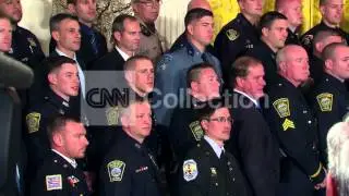 DC:OBAMA BIDEN POSE W POLICE OFFICERS