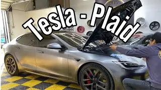 Tesla Plaid wrapped by Jekyll and Hydes Custom Car Vinyl Wrap in Satin Gray